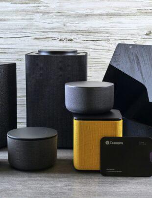 Collection of modern electronic devices and speakers.