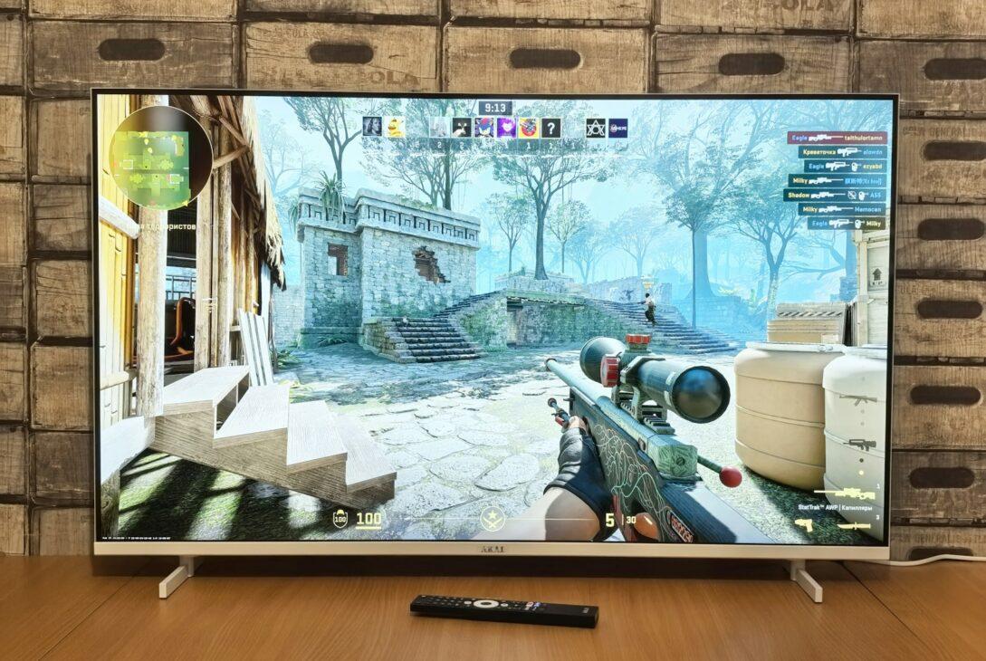 Television screen displaying a first-person shooter video game.