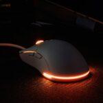 a computer mouse sitting on top of a desk