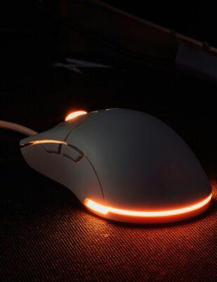 a computer mouse sitting on top of a desk