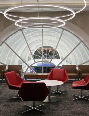 a room with a lot of chairs and tables