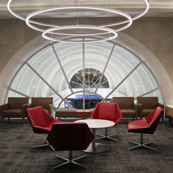 a room with a lot of chairs and tables