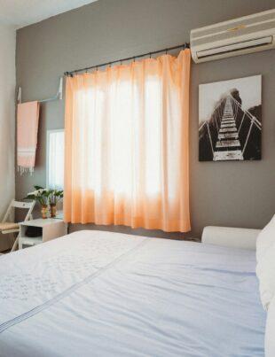 white bedspread inside room