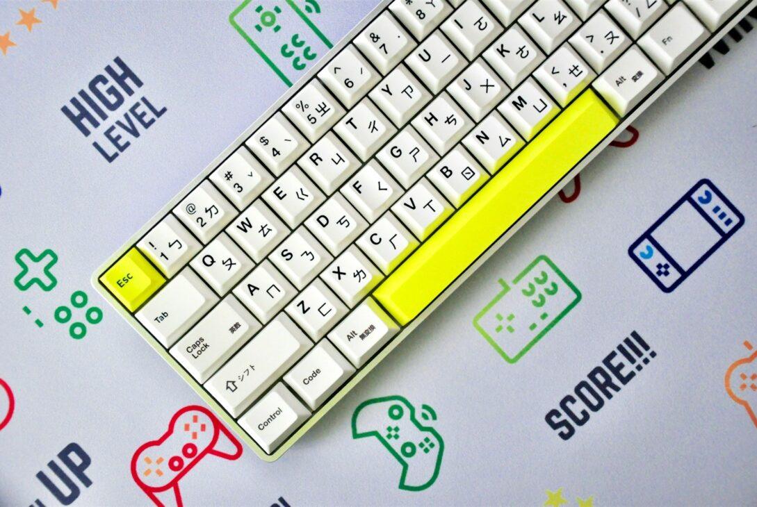 yellow and white keyboard on blue and white surface